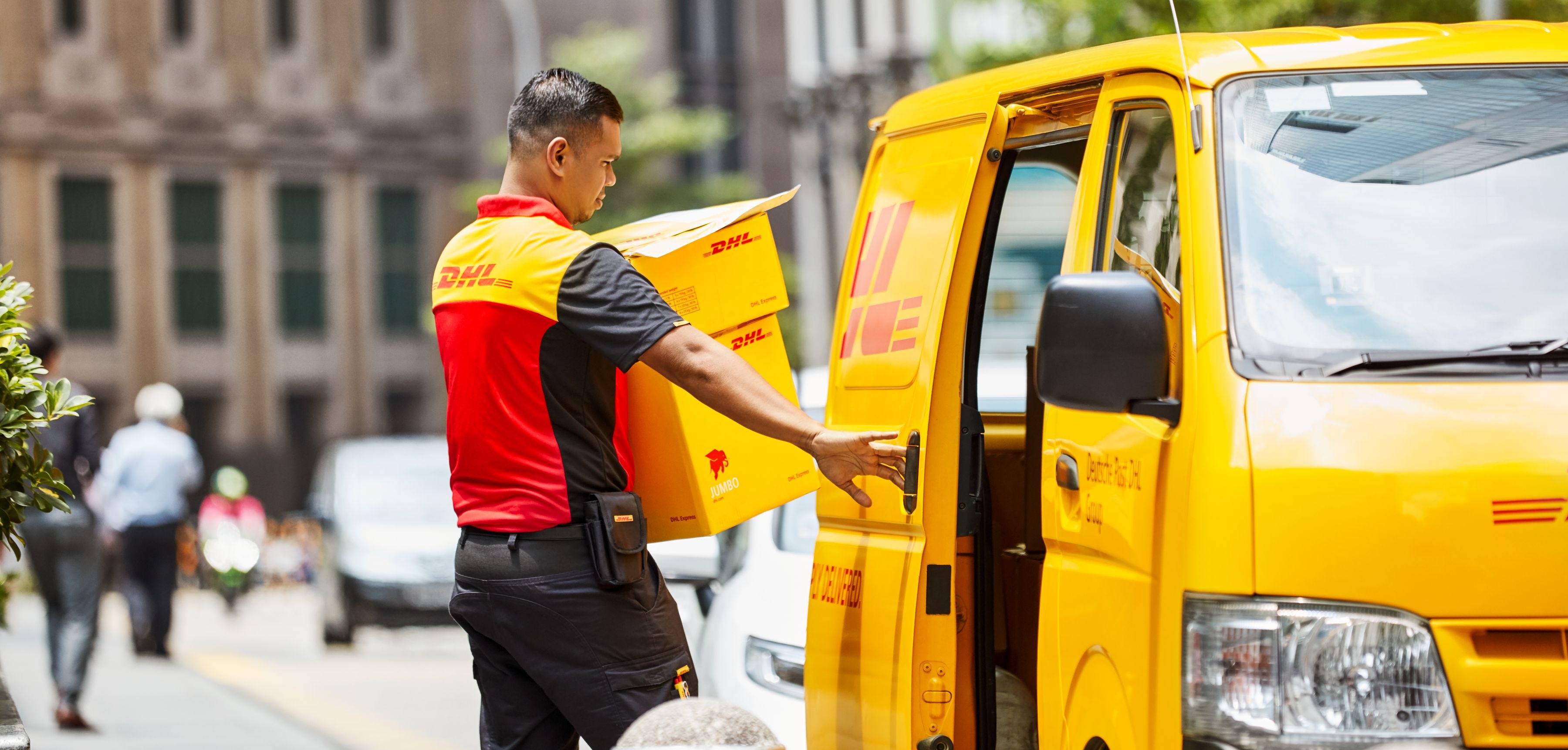Express Domestic Shipping Service In Singapore DHL Express Singapore dhl-express-delivery-van-yellow-car-courier-logistic-truck-editorial